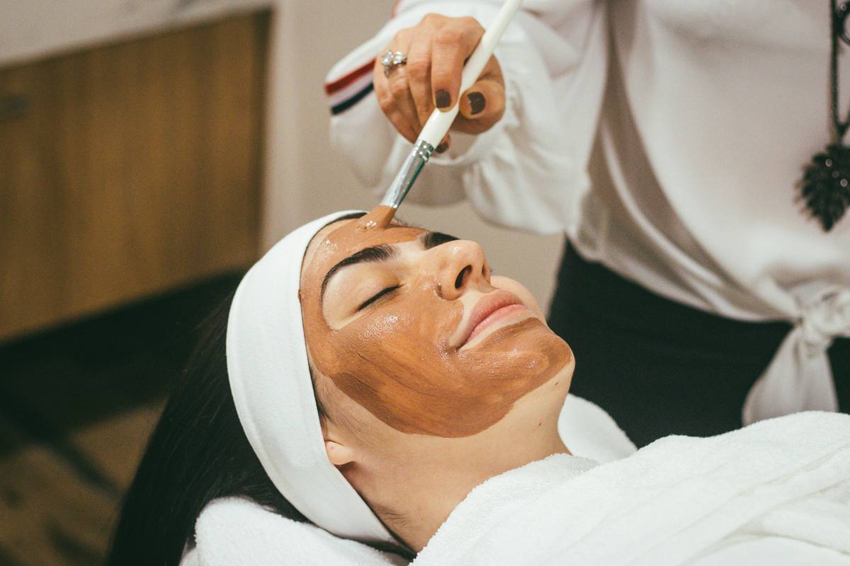 Applying enzyme exfoliation facial treatment to clean, damp skin for optimal enzymatic activity